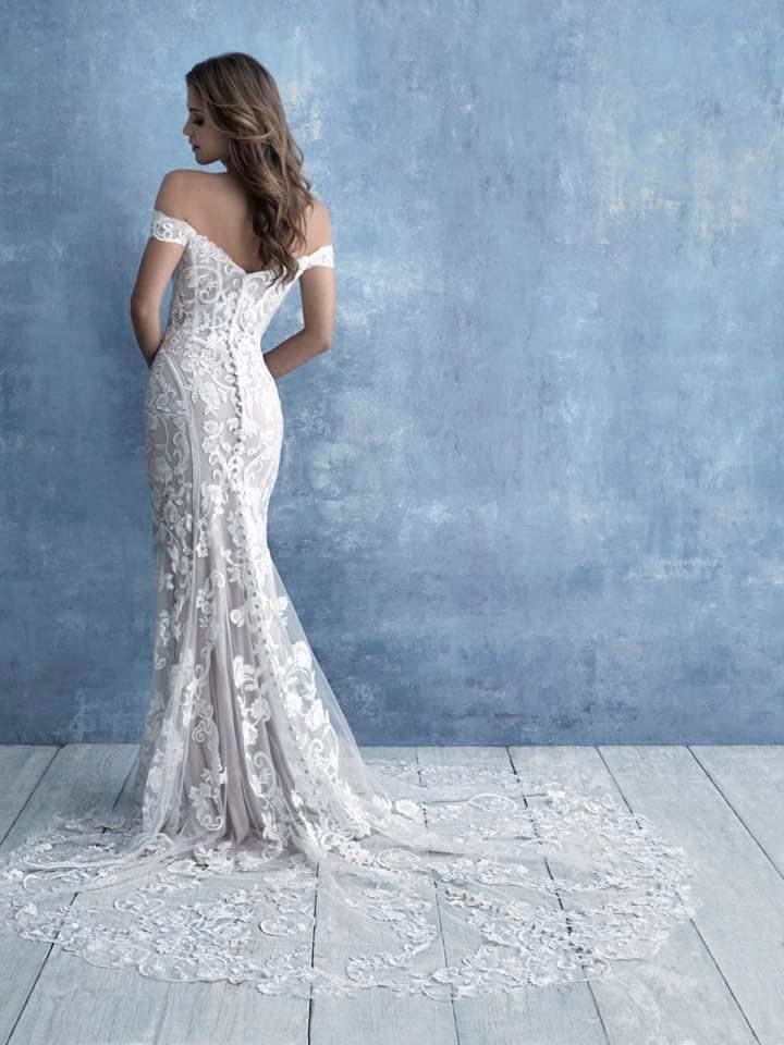 Sand/Ivory lace sheath gown.