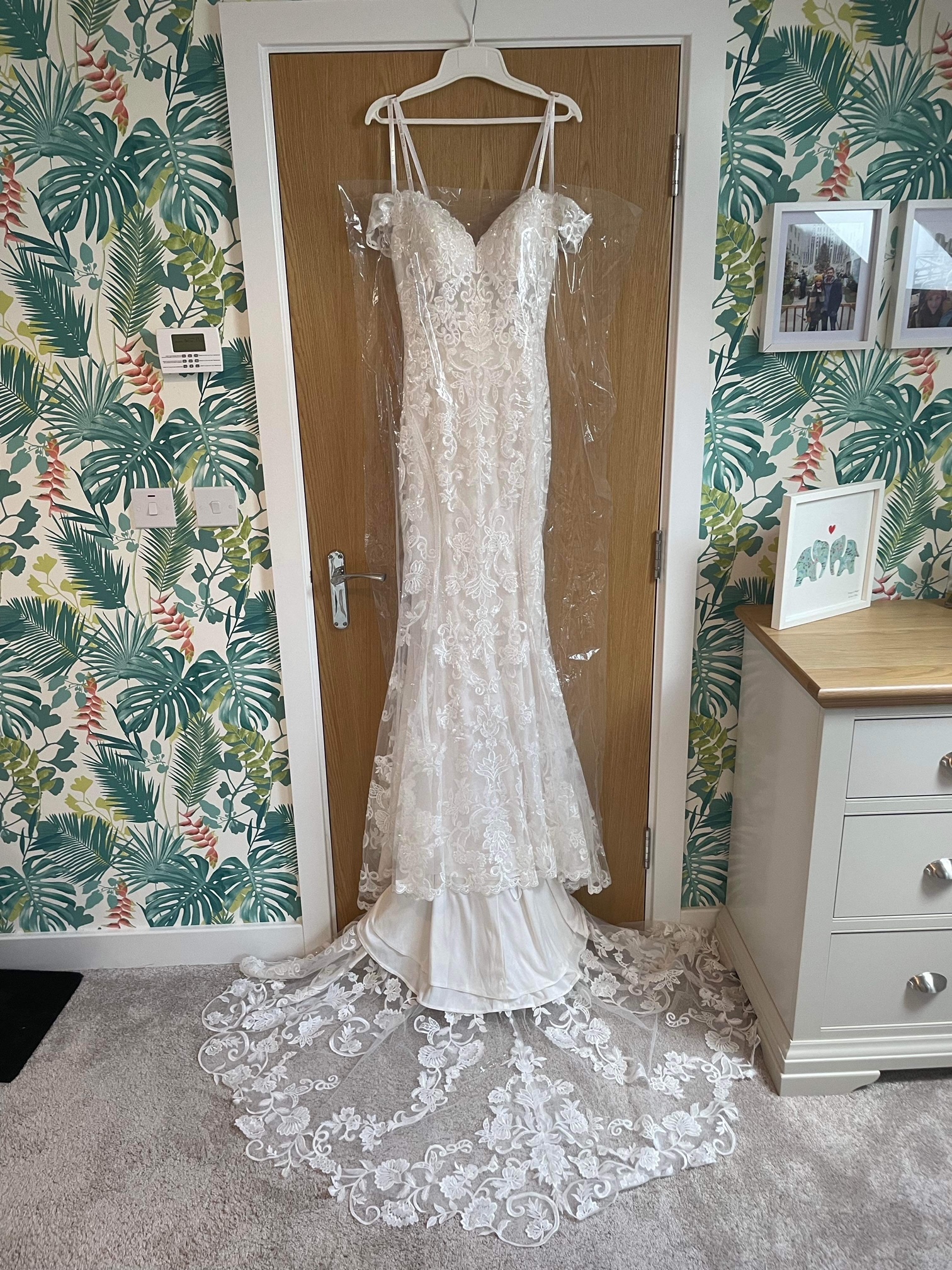 Sand/Ivory lace sheath gown.