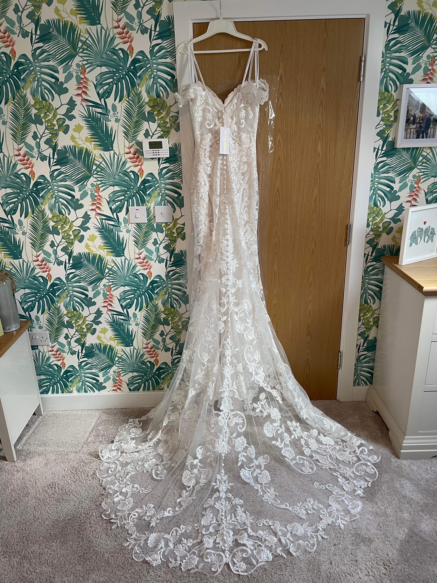 Sand/Ivory lace sheath gown.