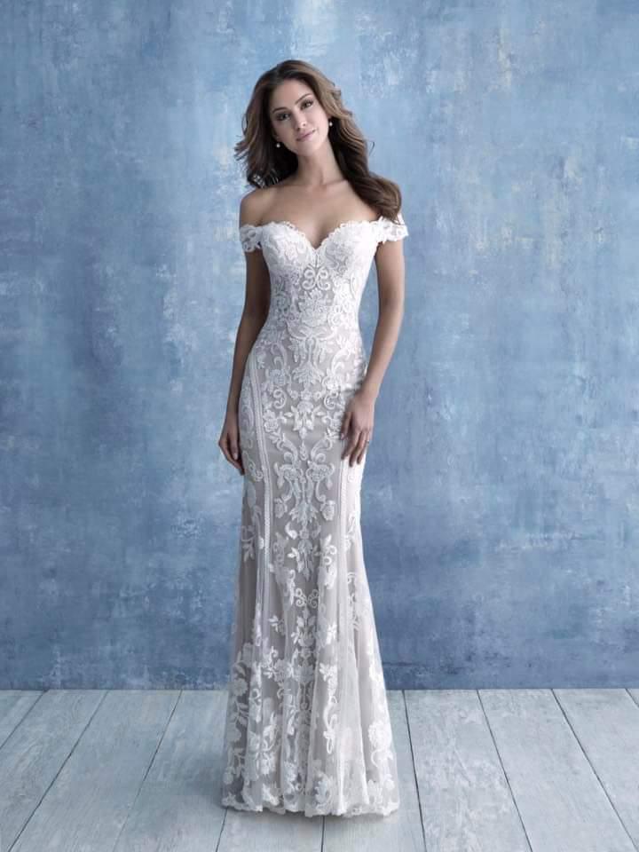 Sand/Ivory lace sheath gown.